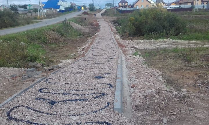 В поселке Яна Юл строят тротуары и дороги (ФОТО)